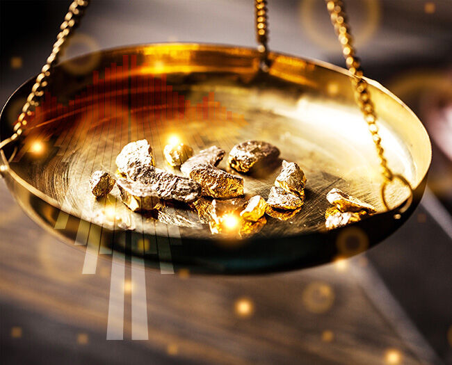 goldwaage-wiegt-gold-ab-goldig Goldpreise Gold in einer Goldwaage