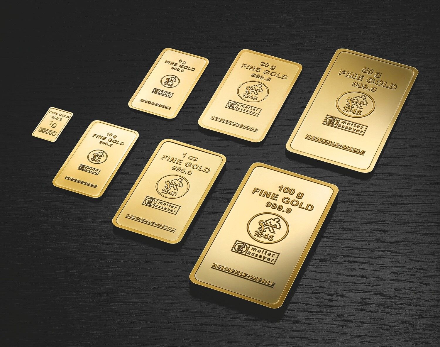 Geprägte Goldbarren als Beispiele für Anlagegold beim Kauf oder Verkauf