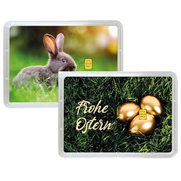 Beidseitige Ansicht eines 0,5 g Goldbarrens von Valcambi in einer Geschenkverpackung mit österlichem Motiv: eine Seite zeigt einen Hasen, die andere den Schriftzug ‚Frohe Ostern