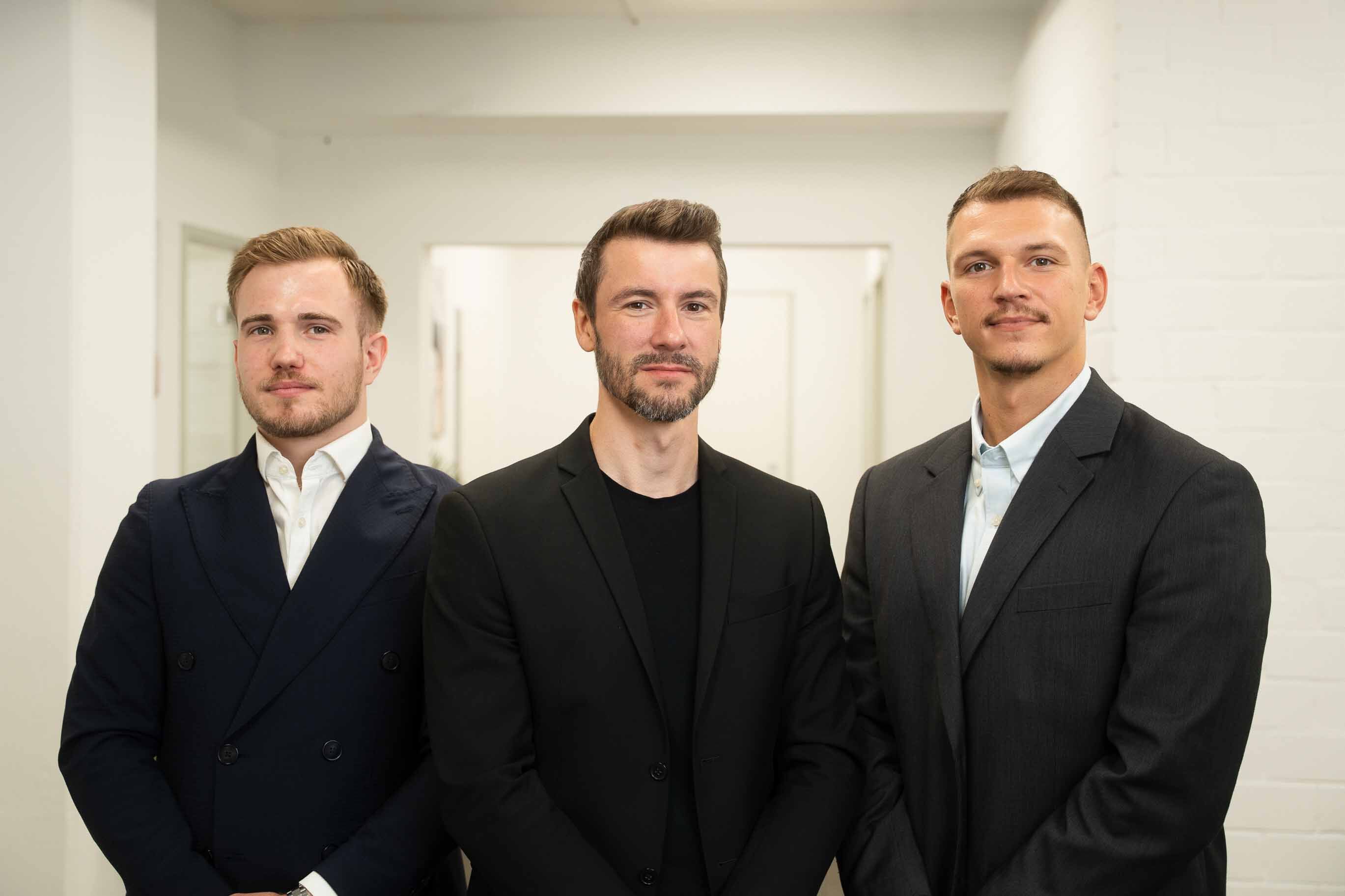 Teamfoto mit Schäfer, Moroder und Popella